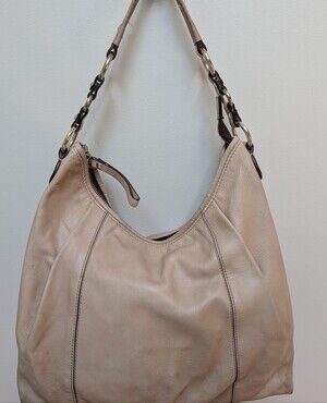 Beautiful Coccinelle genuine leather shoulder bag crafted in Italy.